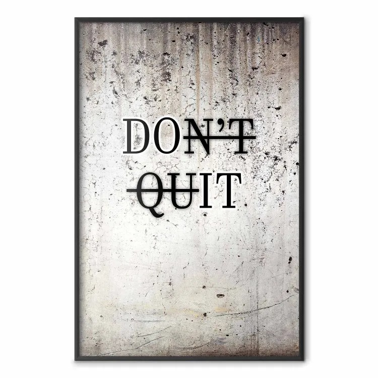 Don't Quit - czarne napisy po angielsku na betonowej teksturze tła