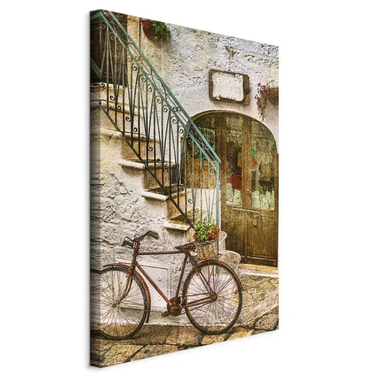 Rower przy kamiennych schodach - fotografia włoskiego miasteczka